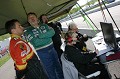 Will and Joe Nonnamaker watch on track action as Jaime Jacoby and Kris Nonnamaker time the action. 