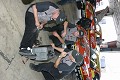 The crew goes to work on fixing the generator. 