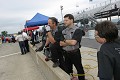 Butch Monnete, Neil Palumbo, and Chris Carney watch on. 